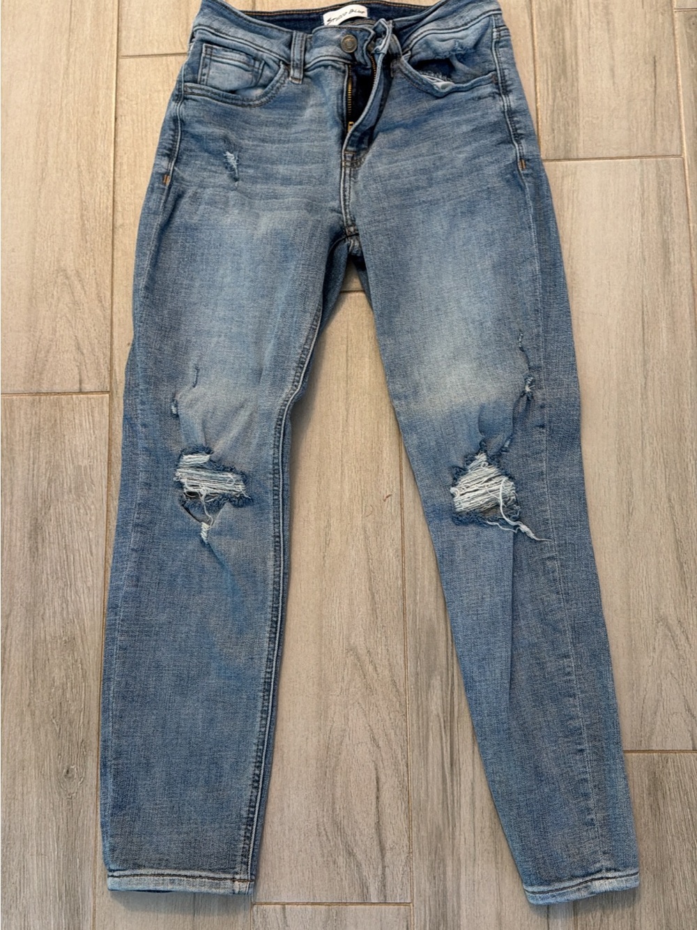 Distressed Light Blue Women’s Skinny Jeans